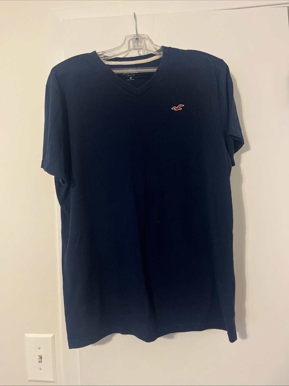 Hollister Men’s Dark Navy V-Neck Tee with Red Logo
